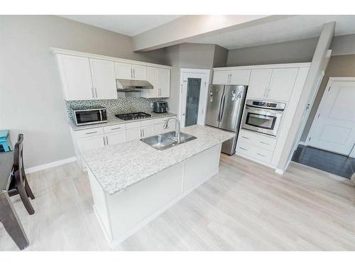 8810 88 Avenue, Grande Prairie, AB - Indoor Photo Showing Kitchen