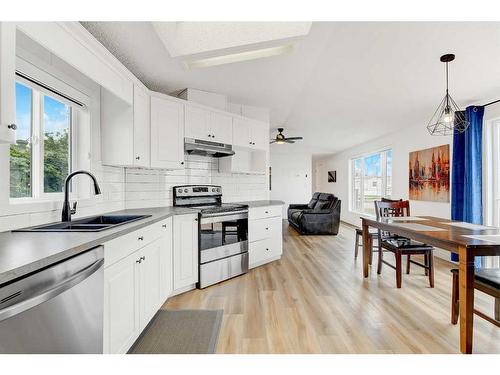 9712 108 Avenue, Clairmont, AB - Indoor Photo Showing Kitchen With Stainless Steel Kitchen With Double Sink