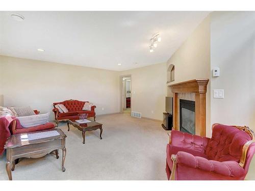 9510 91 Street, Grande Prairie, AB - Indoor Photo Showing Living Room With Fireplace