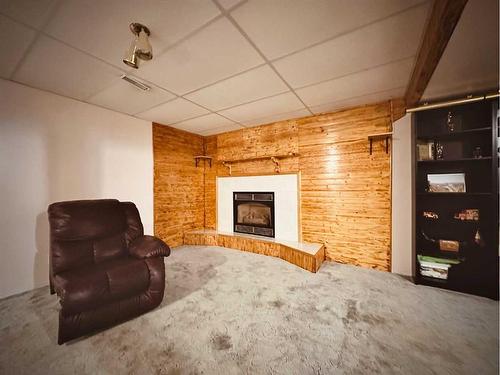 9126 128 Avenue, Peace River, AB - Indoor With Fireplace