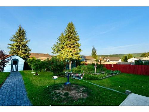 9126 128 Avenue, Peace River, AB - Outdoor With Backyard