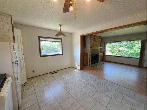 4805 Doyle Avenue, Donnelly, AB - Indoor With Fireplace