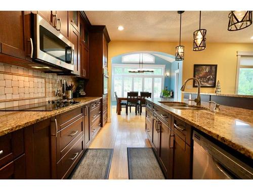 10313 86 Street, Peace River, AB - Indoor Photo Showing Kitchen With Double Sink