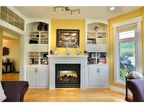 10313 86 Street, Peace River, AB - Indoor Photo Showing Living Room With Fireplace