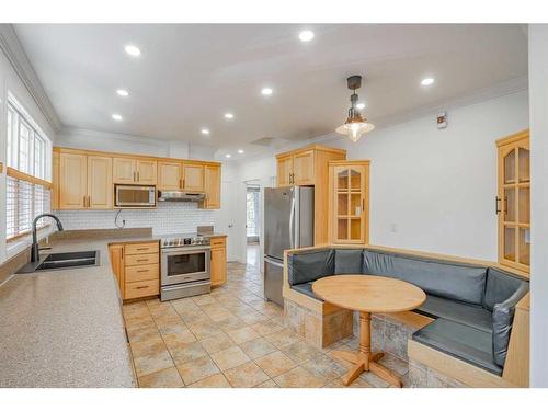 10702 101 Street, Peace River, AB - Indoor Photo Showing Kitchen With Double Sink