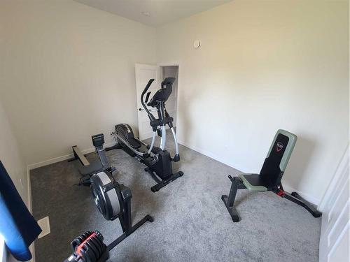 10006 100 Street, Nampa, AB - Indoor Photo Showing Gym Room