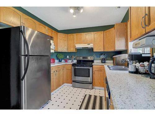 9636 126 Avenue, Grande Prairie, AB - Indoor Photo Showing Kitchen With Double Sink