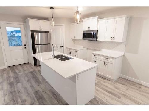 9650 Hillcrest Drive, Grande Prairie, AB - Indoor Photo Showing Kitchen With Double Sink