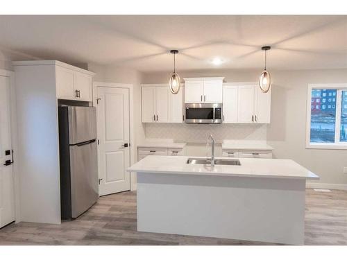 9650 Hillcrest Drive, Grande Prairie, AB - Indoor Photo Showing Kitchen With Double Sink