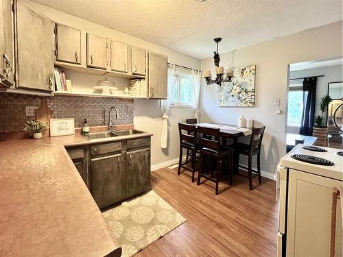 9324 104 Avenue, Grande Prairie, AB - Indoor Photo Showing Kitchen With Double Sink