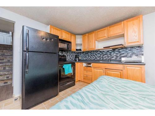 10023 94 Avenue, Grande Prairie, AB - Indoor Photo Showing Kitchen