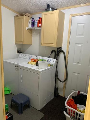 5701 River Road, Fort Vermilion, AB - Indoor Photo Showing Laundry Room