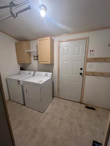 5701 River Road, Fort Vermilion, AB - Indoor Photo Showing Laundry Room