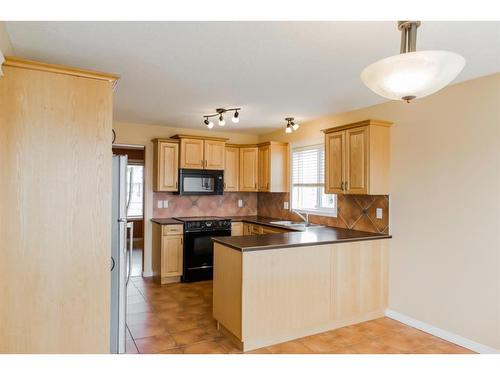 42 Pinnacle Street, Grande Prairie, AB - Indoor Photo Showing Kitchen