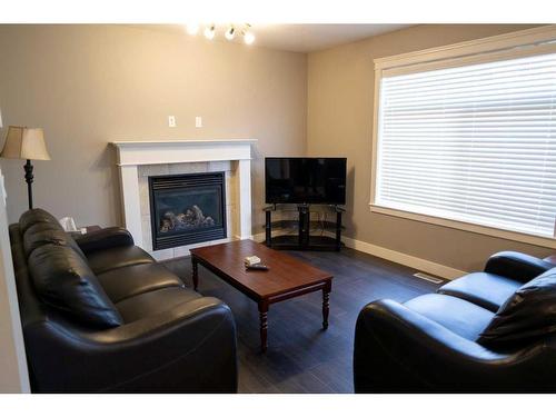 11322 105 Avenue, Grande Prairie, AB - Indoor Photo Showing Living Room With Fireplace