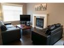 11322 105 Avenue, Grande Prairie, AB  - Indoor Photo Showing Living Room With Fireplace 