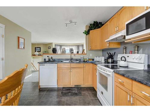 12318 107 Street, Grande Prairie, AB - Indoor Photo Showing Kitchen With Double Sink