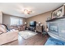 8822 88 B Street, Grande Prairie, AB  - Indoor Photo Showing Living Room With Fireplace 