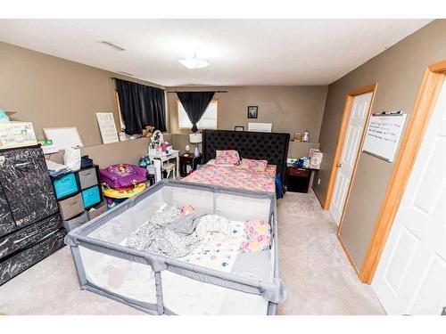 #B-9211 101 Avenue, Grande Prairie, AB - Indoor Photo Showing Bedroom