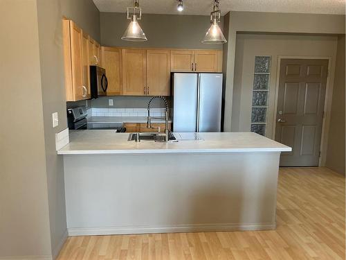 223-12330 102 Street, Grande Prairie, AB - Indoor Photo Showing Kitchen