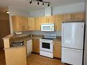 5-4304 51 Street, Spirit River, AB  - Indoor Photo Showing Kitchen With Double Sink 