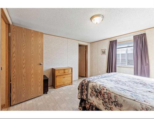 8902 91 Street, Grande Prairie, AB - Indoor Photo Showing Bedroom