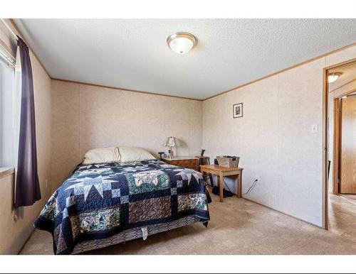 8902 91 Street, Grande Prairie, AB - Indoor Photo Showing Bedroom