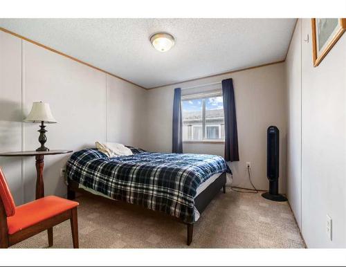 8902 91 Street, Grande Prairie, AB - Indoor Photo Showing Bedroom