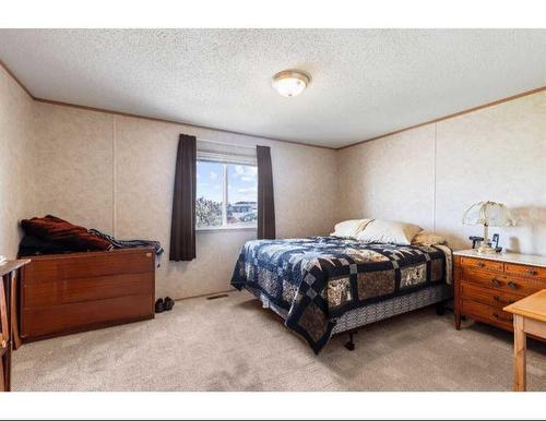 8902 91 Street, Grande Prairie, AB - Indoor Photo Showing Bedroom