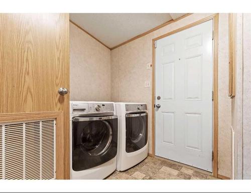 8902 91 Street, Grande Prairie, AB - Indoor Photo Showing Laundry Room