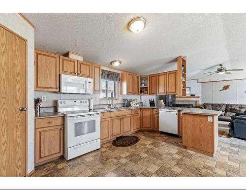 8902 91 Street, Grande Prairie, AB - Indoor Photo Showing Kitchen With Double Sink