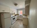 #1, 11019 99 Street, Peace River, AB  - Indoor Photo Showing Kitchen 