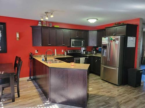 11307 91 Street, Peace River, AB - Indoor Photo Showing Kitchen With Double Sink