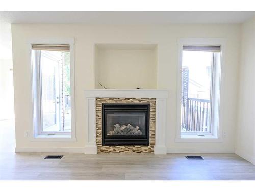 12702 106 Street, Grande Prairie, AB - Indoor Photo Showing Living Room With Fireplace