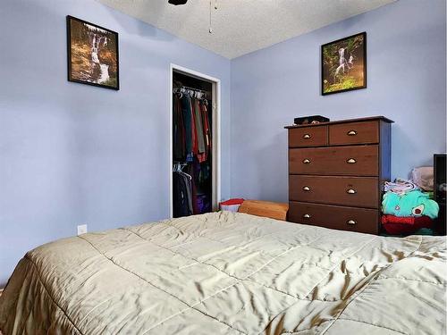 11325 Leonard Street, Grande Cache, AB - Indoor Photo Showing Bedroom