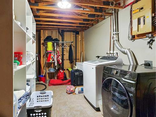 11325 Leonard Street, Grande Cache, AB - Indoor Photo Showing Laundry Room