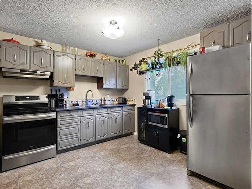 11325 Leonard Street, Grande Cache, AB - Indoor Photo Showing Kitchen