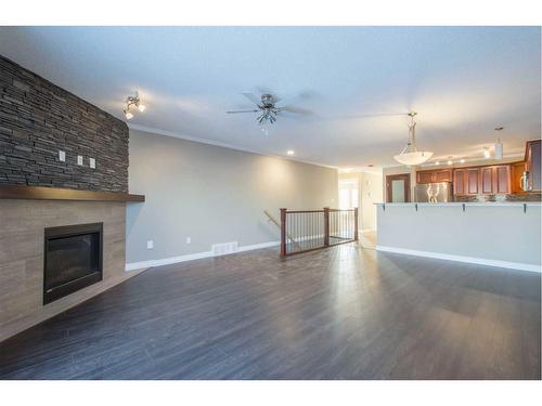 5215 52 Street, Valleyview, AB - Indoor Photo Showing Living Room With Fireplace