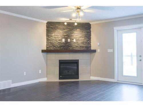 5215 52 Street, Valleyview, AB - Indoor Photo Showing Living Room With Fireplace