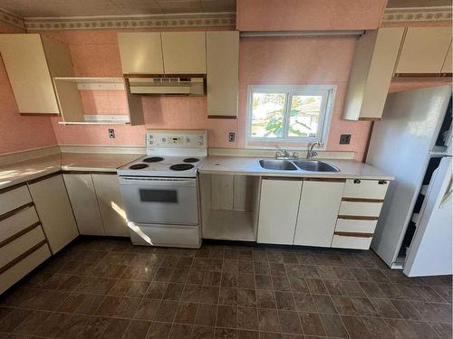 5108 48 Street, Girouxville, AB - Indoor Photo Showing Kitchen With Double Sink