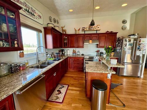 13502-790 Township Road, Rural Saddle Hills County, AB - Indoor Photo Showing Kitchen With Double Sink