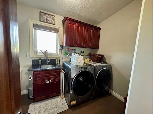 13502-790 Township Road, Rural Saddle Hills County, AB - Indoor Photo Showing Laundry Room