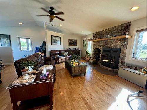 13502-790 Township Road, Rural Saddle Hills County, AB - Indoor Photo Showing Living Room With Fireplace