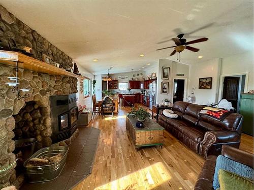 13502-790 Township Road, Rural Saddle Hills County, AB - Indoor Photo Showing Living Room With Fireplace