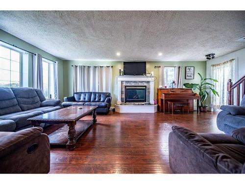 Rge Rd 54, Rural Spirit River No. 133, M.D. Of, AB - Indoor Photo Showing Living Room With Fireplace