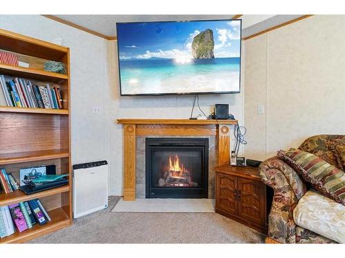 405-Silver Pointe Drive, Rural Grande Prairie No. 1, County Of, AB - Indoor Photo Showing Living Room With Fireplace