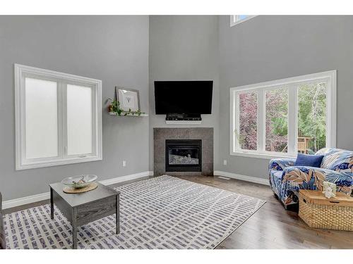 8013 112 Street, Grande Prairie, AB - Indoor Photo Showing Living Room With Fireplace