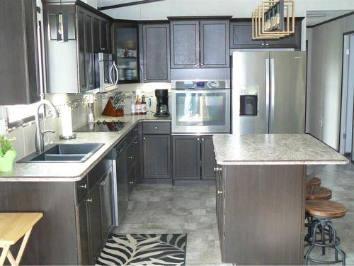 75010 163A Range, High Prairie, AB - Indoor Photo Showing Kitchen With Double Sink With Upgraded Kitchen