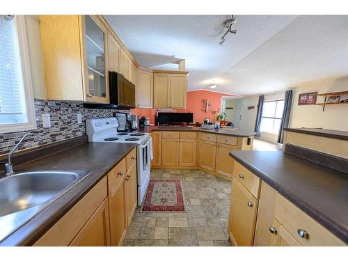 8806 85 Avenue, Grande Prairie, AB - Indoor Photo Showing Kitchen