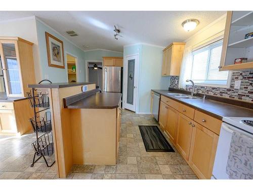 8806 85 Avenue, Grande Prairie, AB - Indoor Photo Showing Kitchen With Double Sink